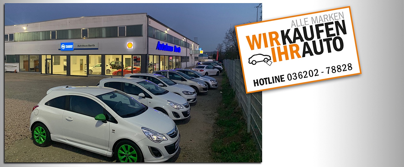 AUtohaus Barth beleuchtet mit Autos davor, ein Störer mit Telefonnummer zum Thema Ankauf im Bild